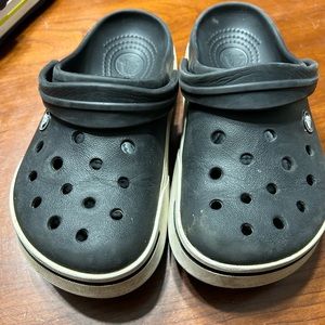 Black crocs m4/w6 also fits a j4